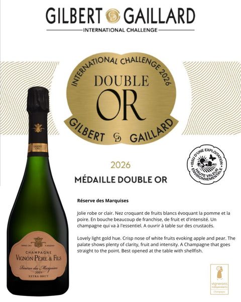 Réserve des Marquises 2018, Grand Cru, Extra Brut champagne bottle with a gold label and green glass.